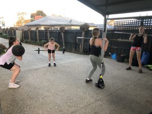Kids using weights safely in the gym